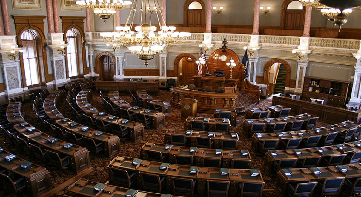 Kansas legislators discussing child protection reforms on television